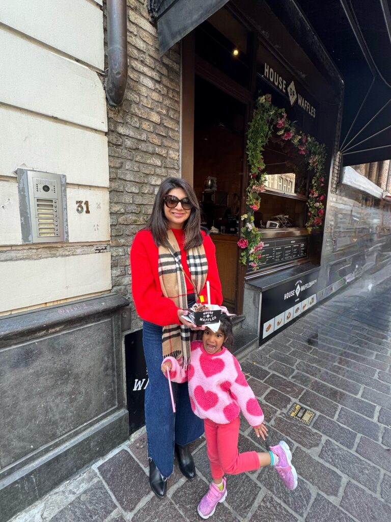 a wife and daughter taking a picture