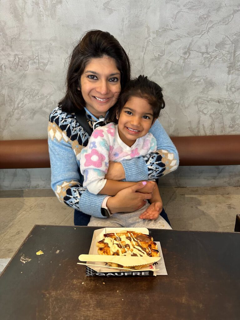 A mother and her daughter taking a picture