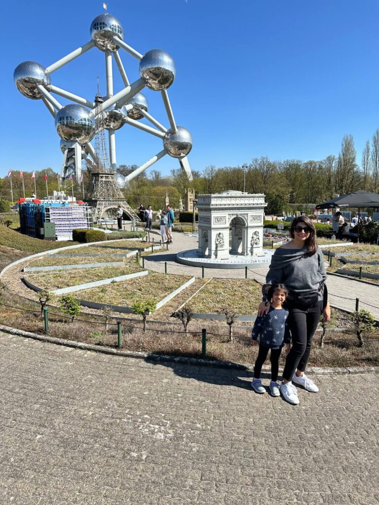 A wife and daughter taking a picture in Brussel Atonium
