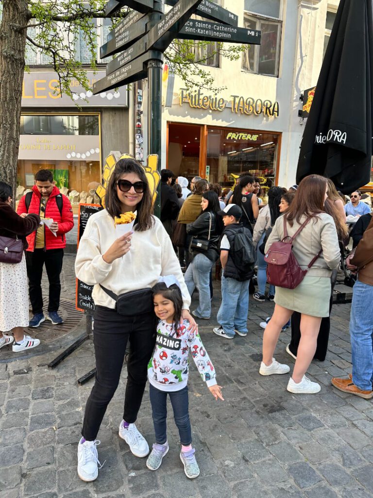 A mother and her daughter taking a picture